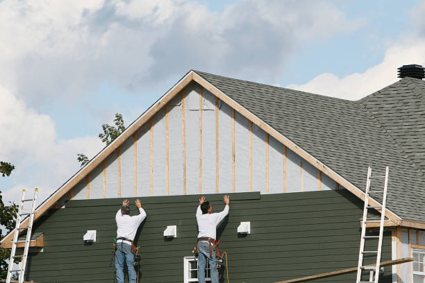 Professional Siding technician working in Fairfax Station, VA